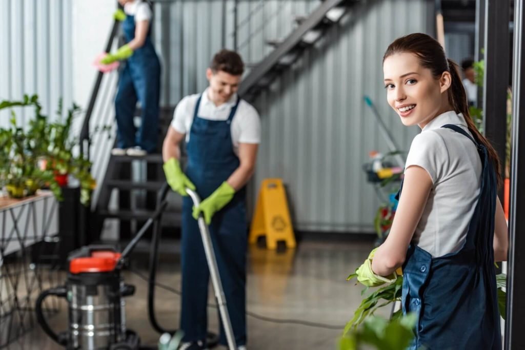 attractive cleaner smiling at camera 1024x683 1 1